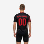 Back view of black and red custom mens soccer training jersey showing player name and number in red sublimation print