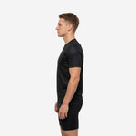 Close detail of red camo sleeve pattern on black mens custom soccer training jersey showing dot-burst fade