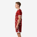 Crimson custom soccer uniform set right side view displaying full-dye sublimation geometric pattern on jersey and shorts