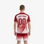 Custom red soccer jersey front detail showing team name and number print zones in full-dye sublimation gradient colorway