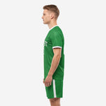 Custom men's soccer uniform in Kelly Green and White side profile showing pinstripe texture and athletic cut fit