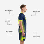 Neon yellow player number on left leg of navy blue custom soccer shorts matching the yellow soccer uniform set