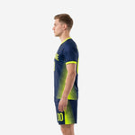 Right side view of men's custom yellow soccer uniform in navy blue with neon yellow line-burst panels and matching shorts