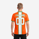 Close detail of Kelly Green collar and cuff trim on Athletic Orange custom soccer jersey