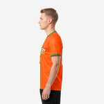 Bold orange soccer jersey with vertical white panel and green border stripe, right side view on male model