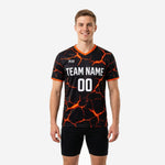 Bold orange soccer training jersey with black lava-crack sublimated print, mens V-neck short sleeve, front view showing team name and number