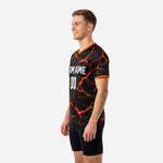 Mens orange soccer training jersey with full sublimation print, right side view displaying team name and player number on black base