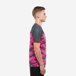 Side view of bold hot pink and charcoal digital camo custom printed soccer jersey showing sleeve and panel detail