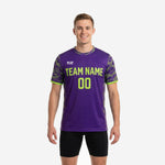 Bold purple custom soccer training jersey with neon green team name and number on the front chest, worn by adult male model