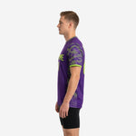 Right-side view of bold purple custom soccer training jersey displaying camo pattern on sleeve and athletic cut fit