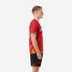 Jet Black custom soccer shorts detail showing ember spark sublimation print and red player number on leg