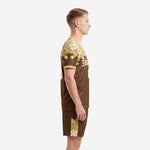 Brown and gold sublimated soccer uniform side view showing mosaic yoke and shorts panel