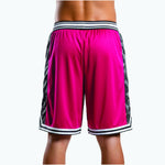 Close-up detail of the geometric triangular black side panel and white-and-black striped hem split on red custom basketball shorts