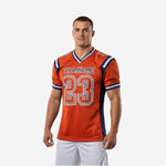 Bulk football jerseys in orange and navy with V-neck collar, side panels, and sublimated front number 23 and team name arc on the chest