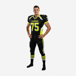 Bulk football uniforms in black and neon yellow with front chest number 75, team name, diagonal side panels, and matching pants with triple leg stripe - front view