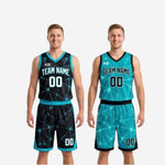 Close detail of the reversible basketball shorts showing the geometric star-burst sublimated print and contrast waistband trim