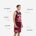 Close detail of galaxy print constellation and comet graphics sublimated into the maroon basketball jersey fabric