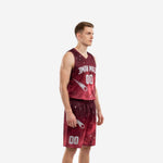 Side view of maroon galaxy basketball uniform set showing constellation lines on jersey and silver comet graphic on shorts leg