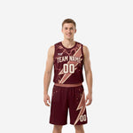 Burgundy basketball uniforms full set front view, deep maroon jersey with rose-gold lightning-bolt sublimation and matching shorts