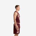Custom maroon and rose-gold basketball uniform front view showing team name arc and double-zero number on the jersey chest
