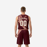 Opposite side view of burgundy basketball uniform set showing scattered metallic-dot sublimation on jersey and shorts