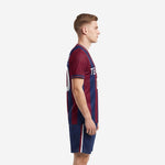 Sublimated burgundy navy soccer kit left side view showing stripe pattern and shorts