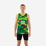 Custom camo basketball jerseys in green and brown with neon yellow-green V-neck trim, arched team name and front number, front view on male model