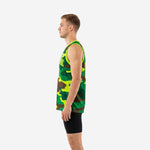Side view of sublimated green camo basketball jersey showing V-neck depth, armhole binding, and straight hem length on male model