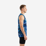 Front view of men's navy blue camo basketball jersey with cyan V-neck trim and white front number on a male model
