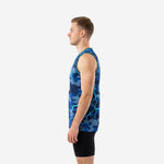 Side view of sublimated navy camo basketball jersey showing cyan armhole binding and straight hem length on male model