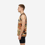 Side view of custom sublimated camo basketball jersey showing sleeveless cut straight hem and black armhole binding on tan camo pattern