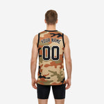 Right side view of camo basketball jersey displaying full sublimation coverage rust olive and black camo pattern and clean side panel