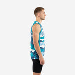 Teal camo basketball jersey with full-coverage sublimated camo pattern in teal, navy, light blue, and white, V-neck collar with teal binding