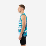 Left side view of custom sublimated camo basketball jersey showing continuous camo pattern wrapping from front panel to side with no seam break