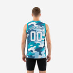 Right side view of teal camo basketball jersey displaying armhole binding detail, straight hem, and tuck-in length on adult male