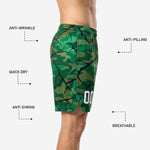 Back view of custom green camo basketball shorts with black crackle overlay print and clean hem finish for team orders youth through adult