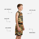 Back view of youth travel basketball uniforms in tan olive and brown camo with back player name and number in black and white