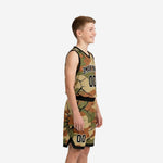 Side angle view of custom printed youth basketball uniforms in woodland camo with black V-neck binding and matching camo shorts