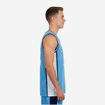 Adult male wearing a custom carolina blue basketball jersey with white side panels and navy-and-white V-neck trim, front view