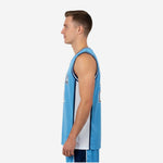Side view of carolina blue sublimated basketball jersey showing white side panel running from armhole binding to straight hem