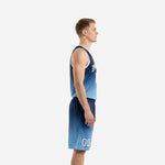 Men's carolina blue basketball uniform showing navy-to-carolina-blue gradient jersey with white V-neck binding, arched team name, and front number 00