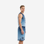 Side view of navy and Carolina blue basketball uniform showing vertical pinstripe gradient on jersey and shorts with navy V-neck binding