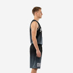 Front view of custom charcoal basketball uniform with arced white team name and number 00 on black-to-charcoal gradient jersey and shorts