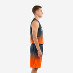 Adult male wearing custom charcoal basketball uniforms with arced team name and number 00 on the orange gradient jersey and matching shorts