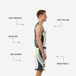 Close-up detail of lime green accent trim and charcoal side panel on white sublimated basketball jersey and shorts set