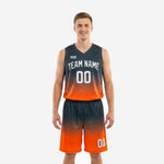 Custom charcoal basketball uniforms with top-to-bottom orange gradient fade showing front and back of the full jersey and shorts set