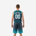 Opposite side view of charcoal and teal custom basketball jersey and shorts set with matching teal hem band and athletic cut fit