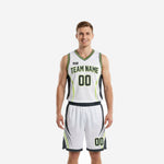 Charcoal basketball uniforms in white with curved charcoal side panels and lime green accent trim, full two-piece set front view on male model