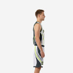 White and charcoal basketball uniform two-piece set side view showing curved side panel design and lime green accent lines on jersey and shorts