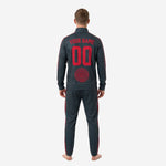 Close side view of charcoal custom soccer track jacket with crimson geometric sublimated stripe and stand collar full-zip construction